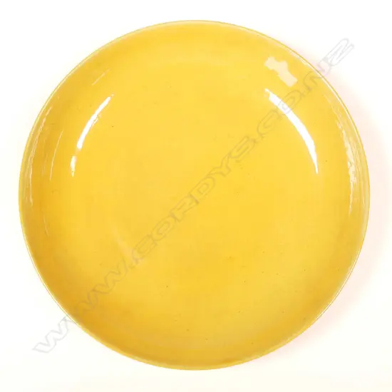 A Chinese Qing dynasty marked Imperial yellow saucer dish