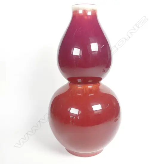 A Chinese double gourd sang de boeuf glazed vase