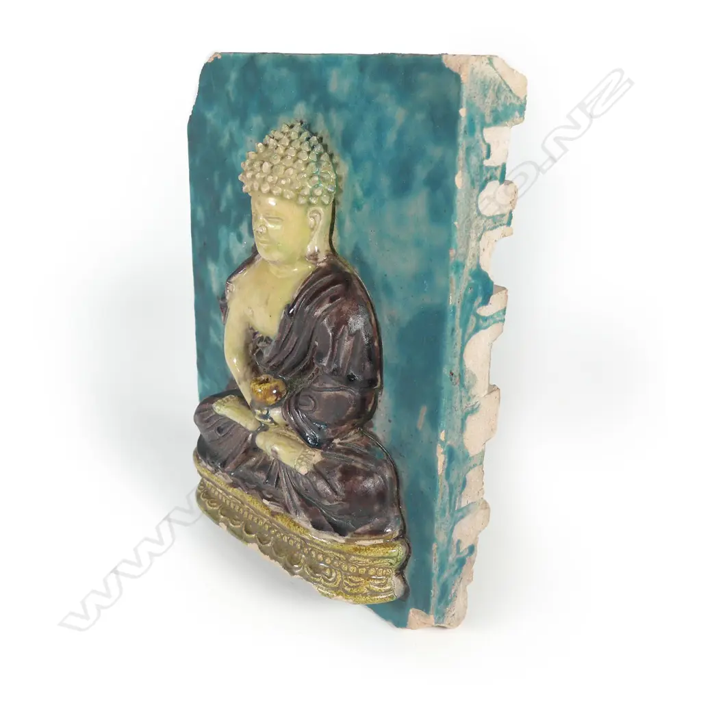 An old Chinese earthenware Sancai glazed tile of a bodhisattva Image 1++