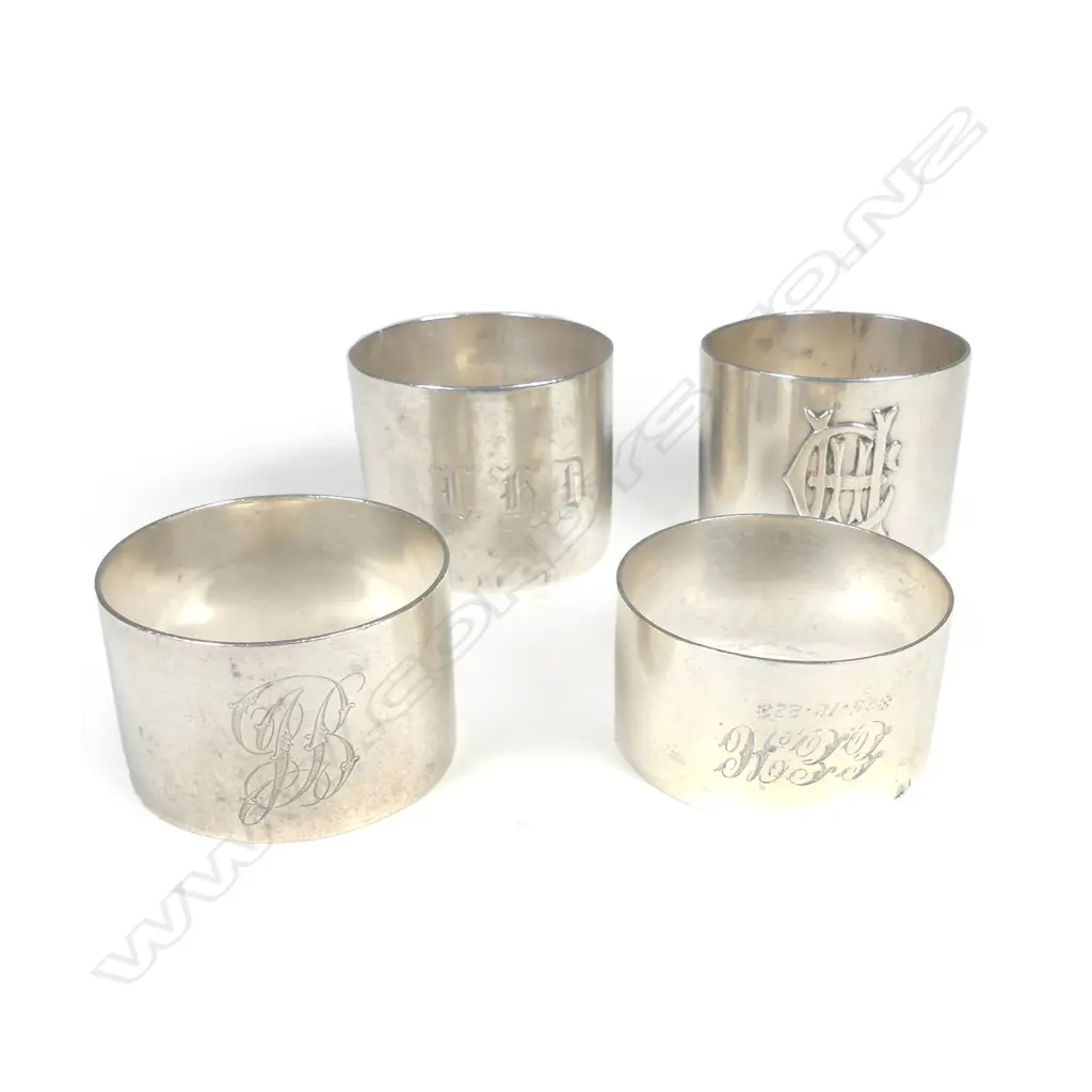 Four N.Z. silver napkin rings each stamped with maker's marks Image 1++