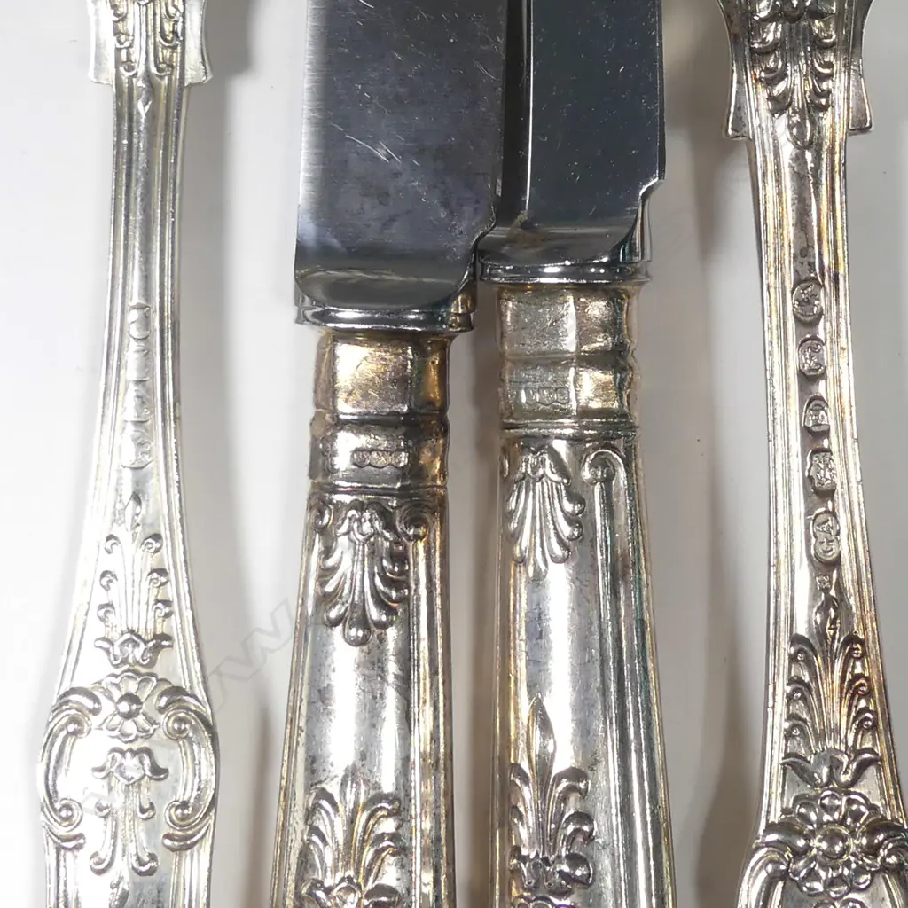 An impressive William IV/early Victorian silver Queens pattern 12 person cutlery service Image 1++