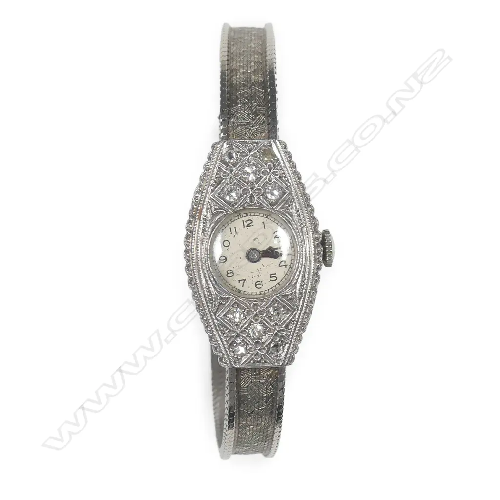 A lady's Art Deco Swiss 18ct. white gold and diamond wristwatch Image 1++
