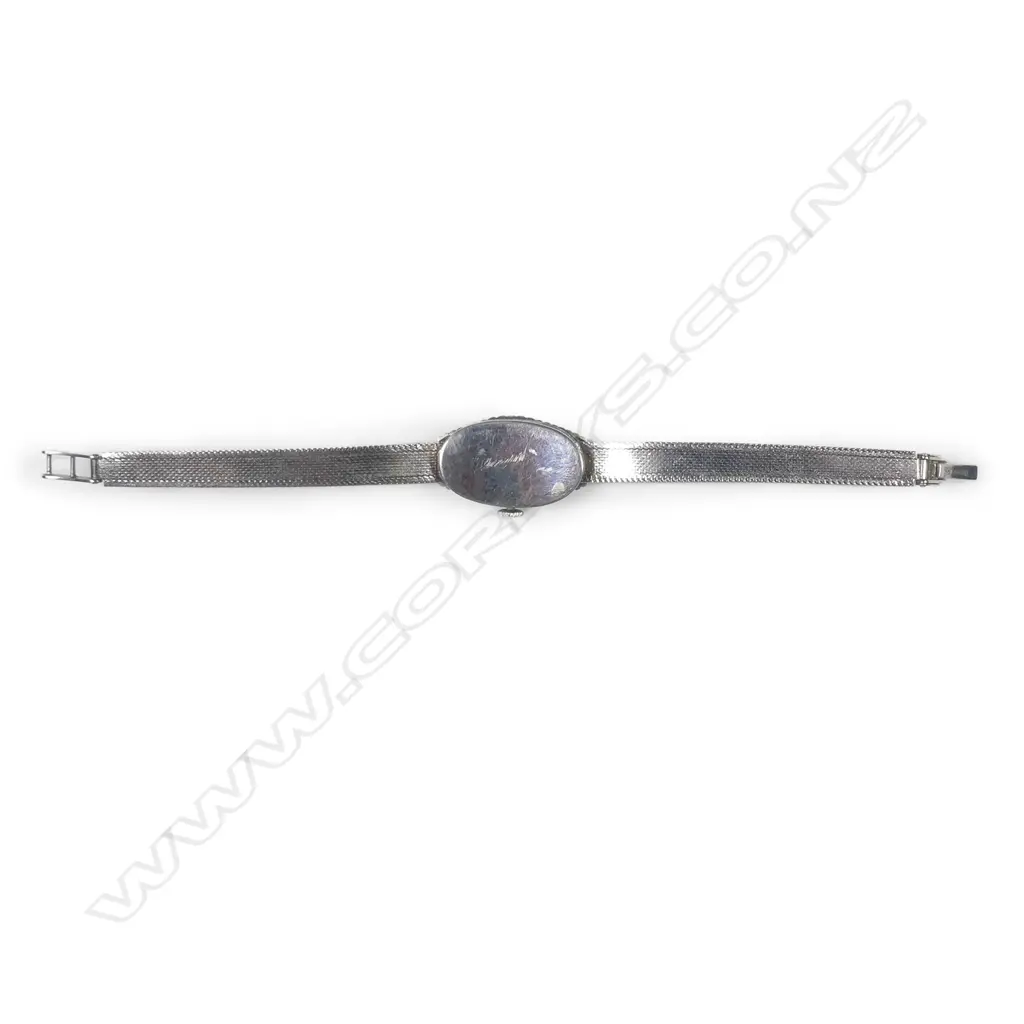 A lady's Art Deco Swiss 18ct. white gold and diamond wristwatch Image 1++
