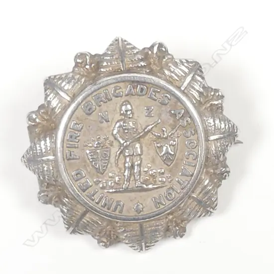 A NZ silver lapel badge