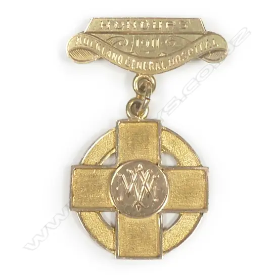 A NZ 15ct gold medallion