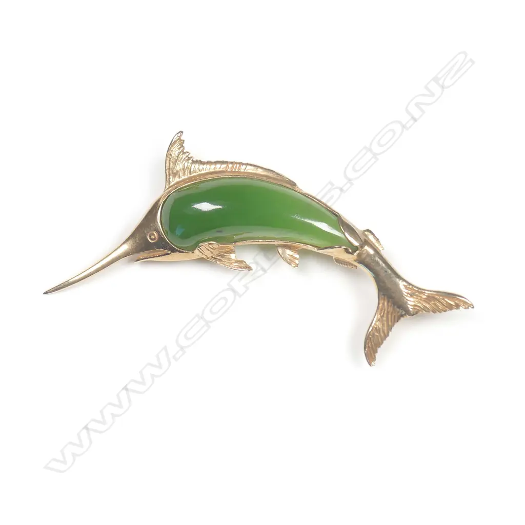 A vintage 9ct gold and greenstone leaping marlin brooch Image 1++