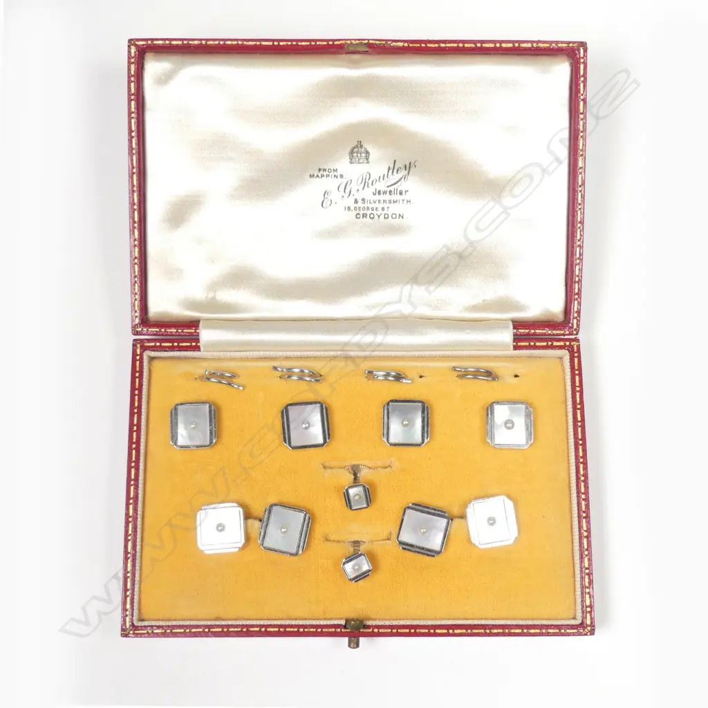 A set of 9ct. white gold mother-of-pearl and seed pearl gentleman's shirt studs and cufflinks Image 1++