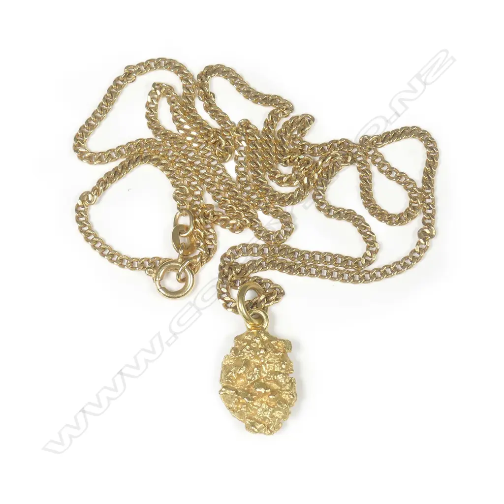 A solid gold pendant on 18ct gold chain Image 1++