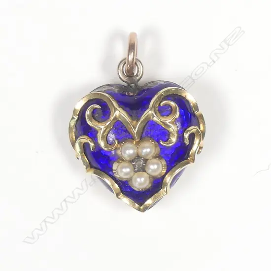 An early 19thC gold blue enamel and seed pearl mourning pendant