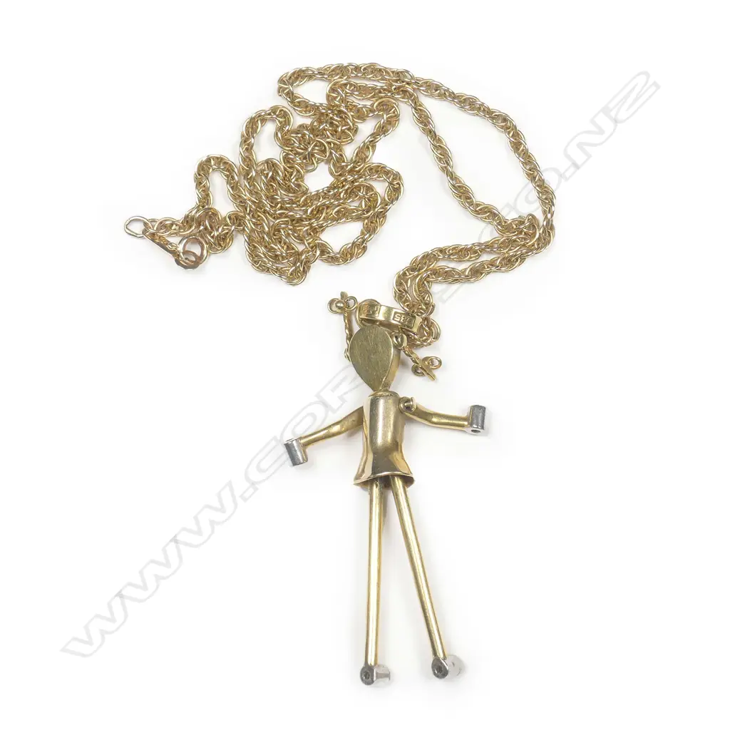 A 14ct gold and diamond set pendant Image 1++