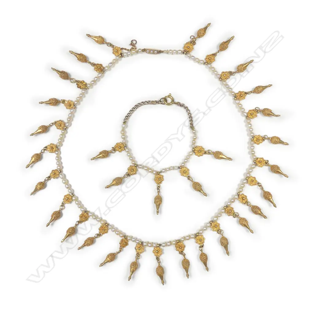 A delicate pearl and gold necklace in the Etruscan Revival style Image 1++