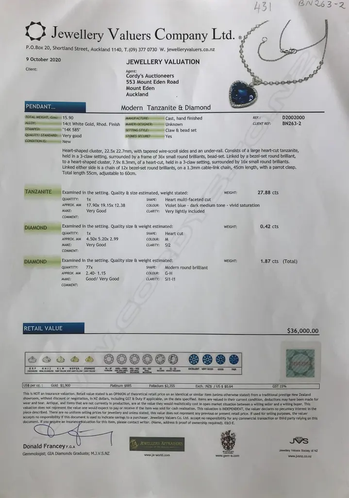 A 14ct white gold tanzanite and diamond pendant Image 1++