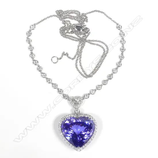 A 14ct white gold tanzanite and diamond pendant