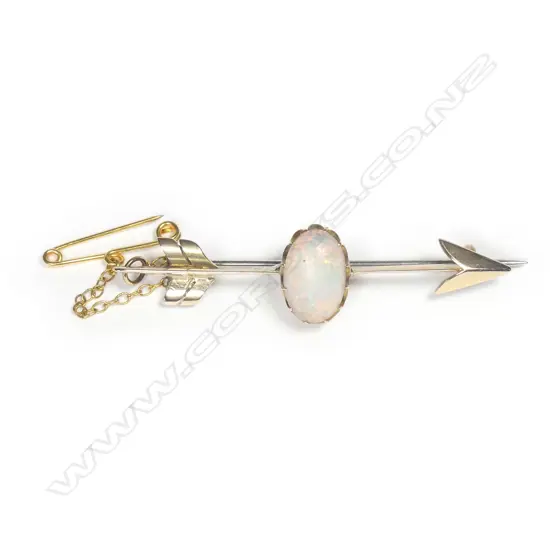 An Edwardian 9ct. yellow gold and opal arrow brooch
