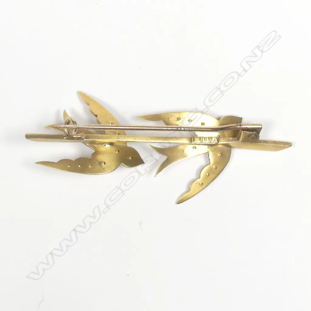 A c.1900 15ct. yellow gold and seed pearl bluebird brooch Image 1++