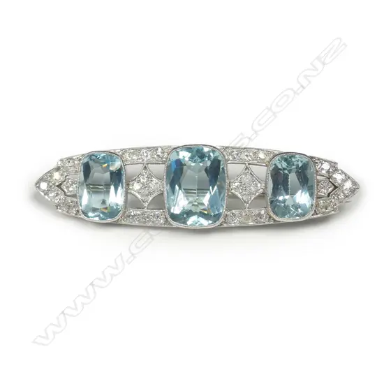 An 18ct white gold platinum aquamarine and diamond Art Deco brooch