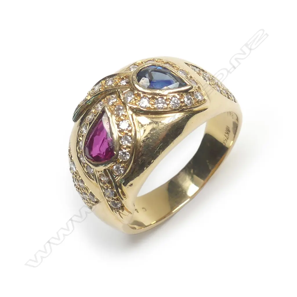 A modern design 18ct. yellow gold sapphire Image 1++