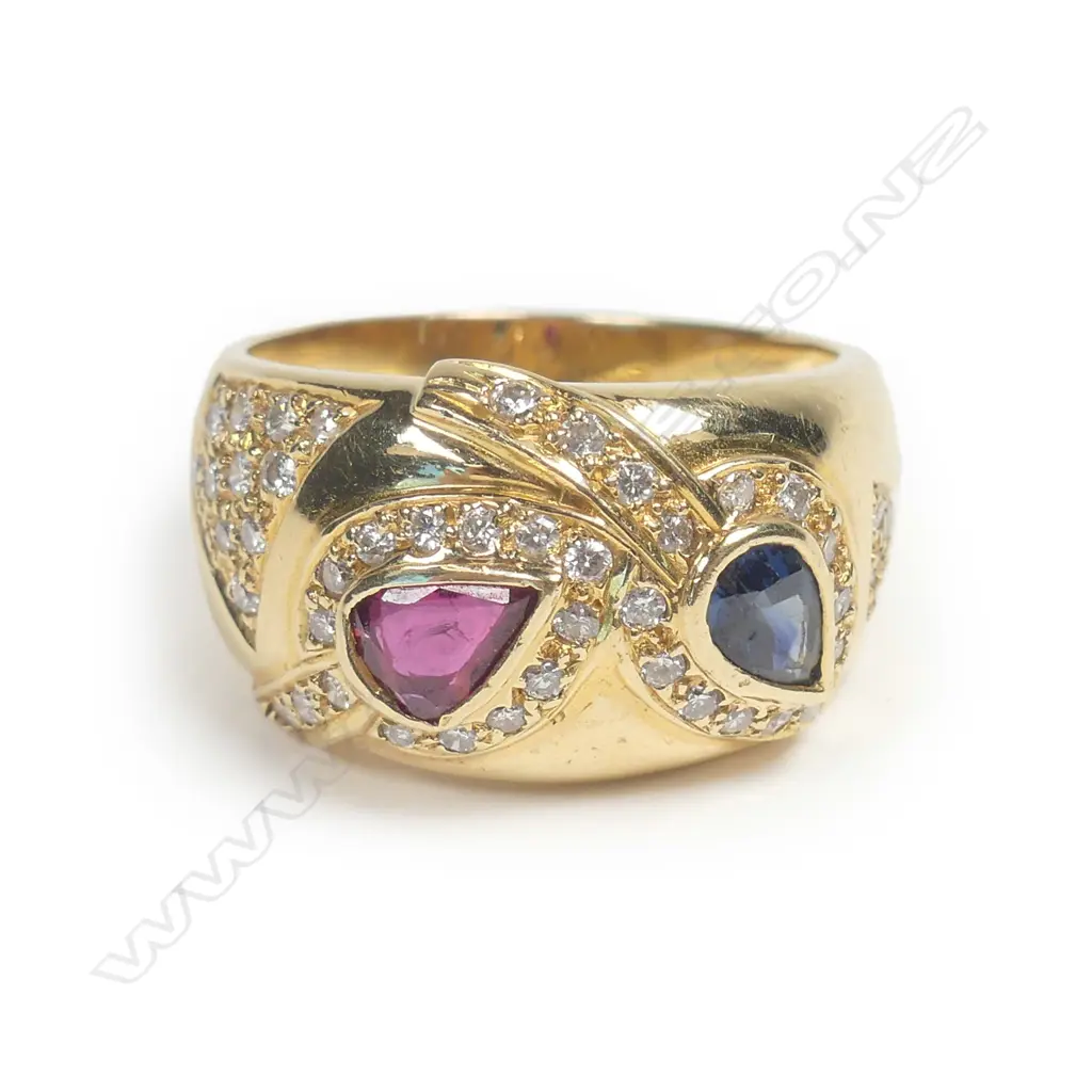 A modern design 18ct. yellow gold sapphire Image 1++