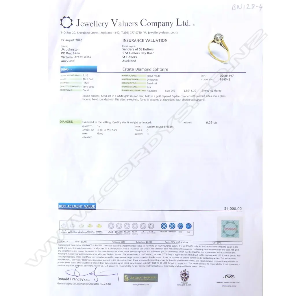 An 18ct gold and diamond solitaire ring Image 1++