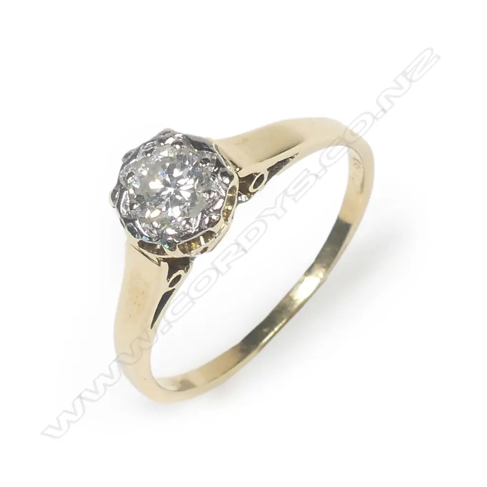 An 18ct gold and diamond solitaire ring Image 1++