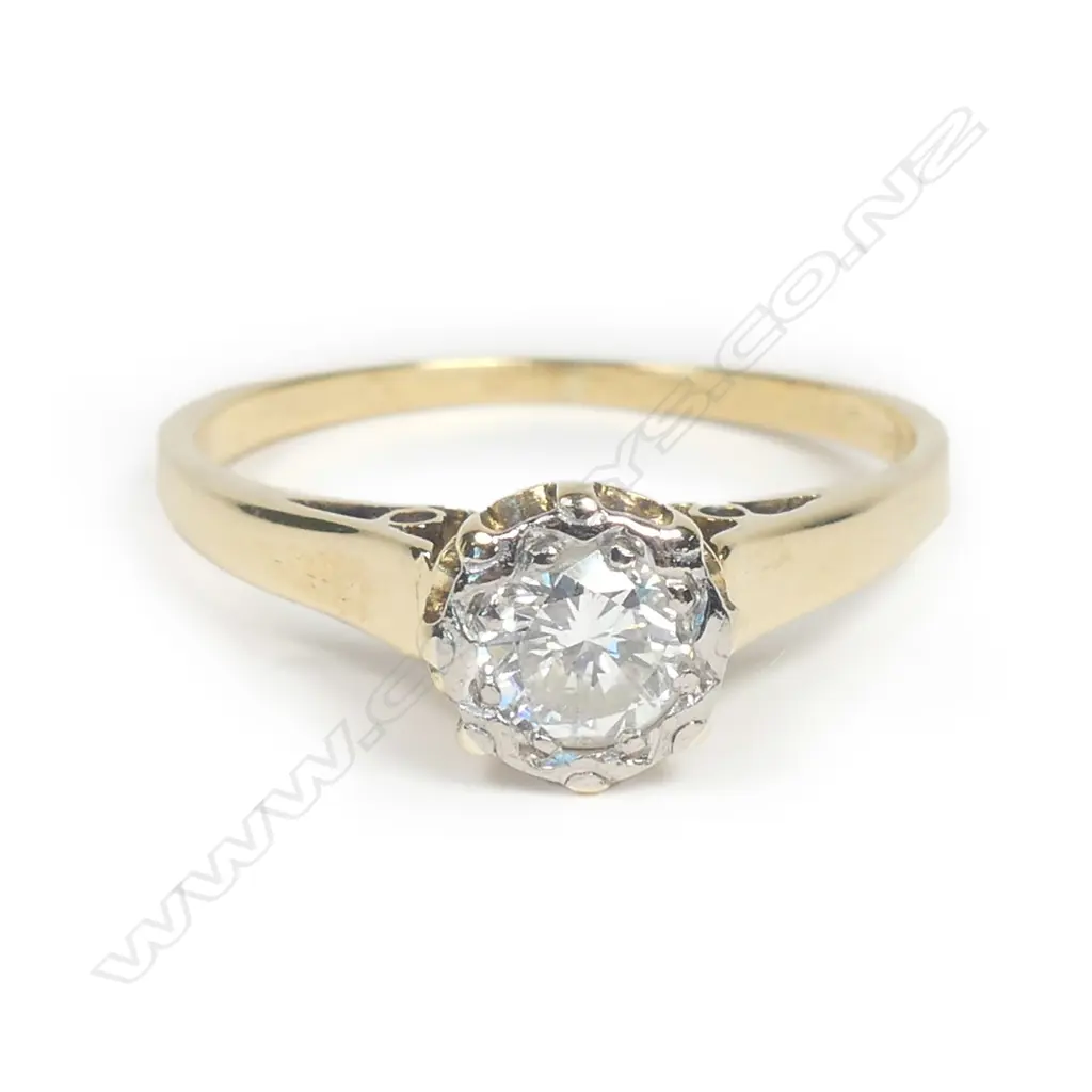 An 18ct gold and diamond solitaire ring Image 1++