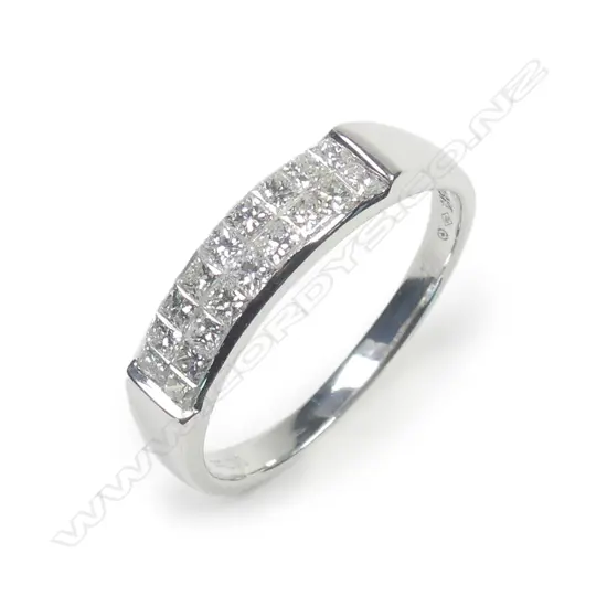 An 18ct white gold and diamond set band