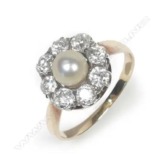 An estate 18ct gold diamond and pearl ring