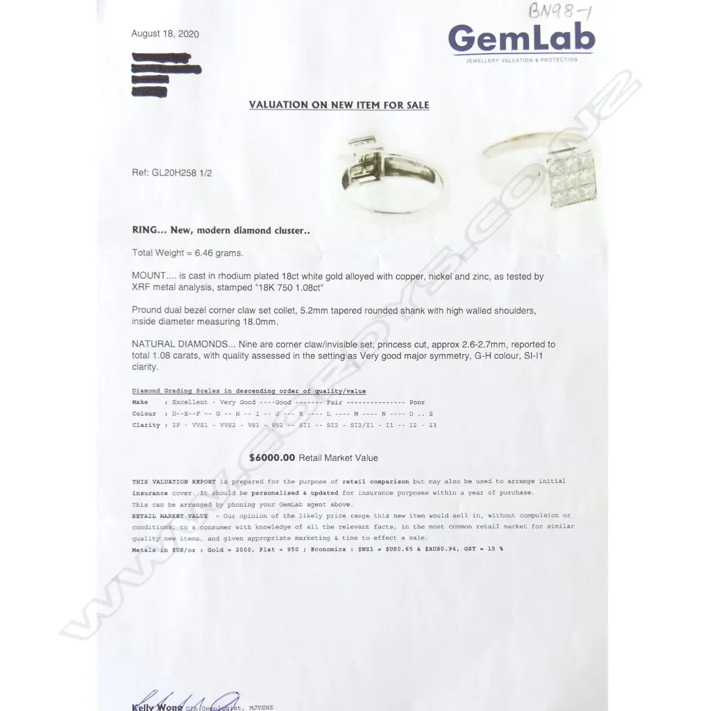 An 18ct white gold and diamond ring Image 1++