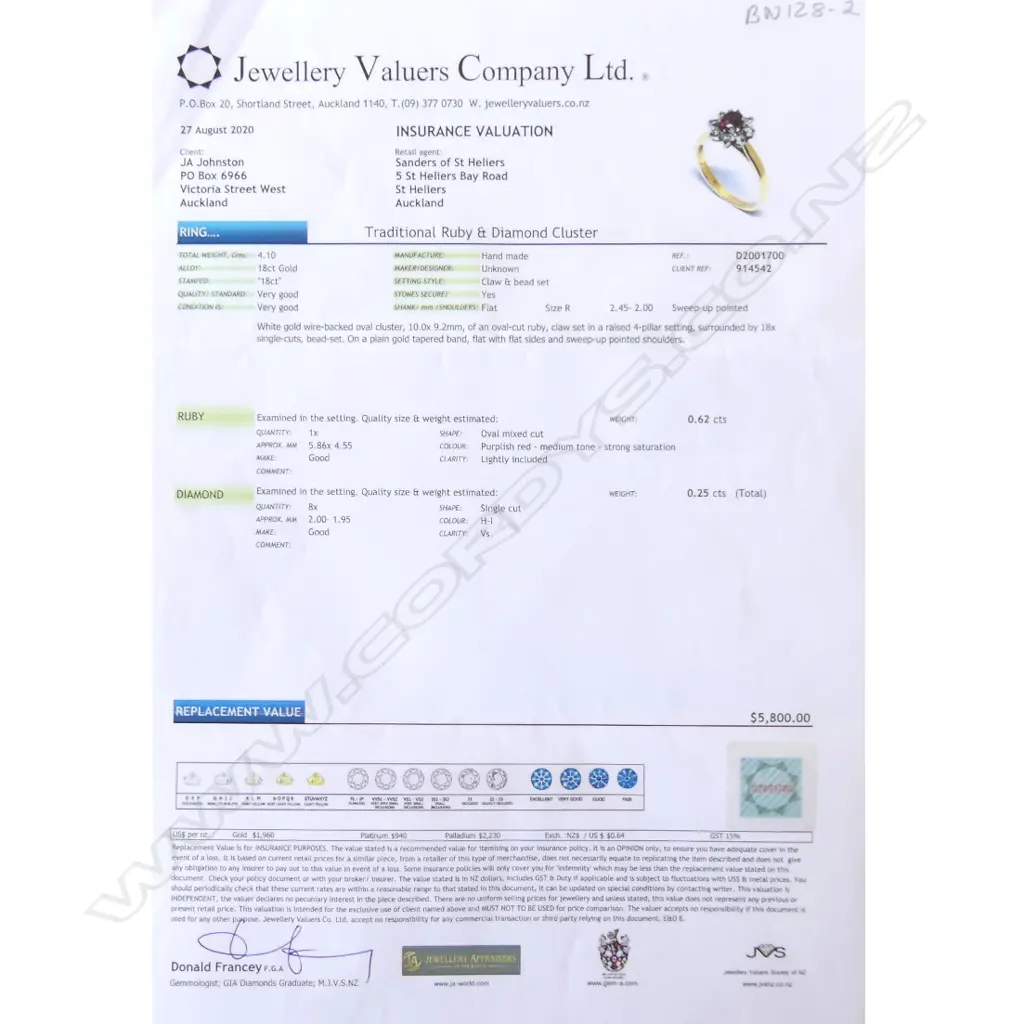 An 18ct gold ruby and diamond ring Image 1++