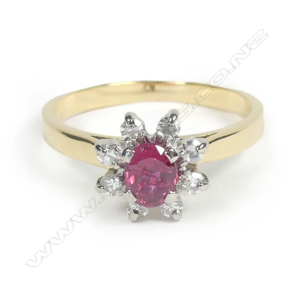 An 18ct gold ruby and diamond ring Image 1++