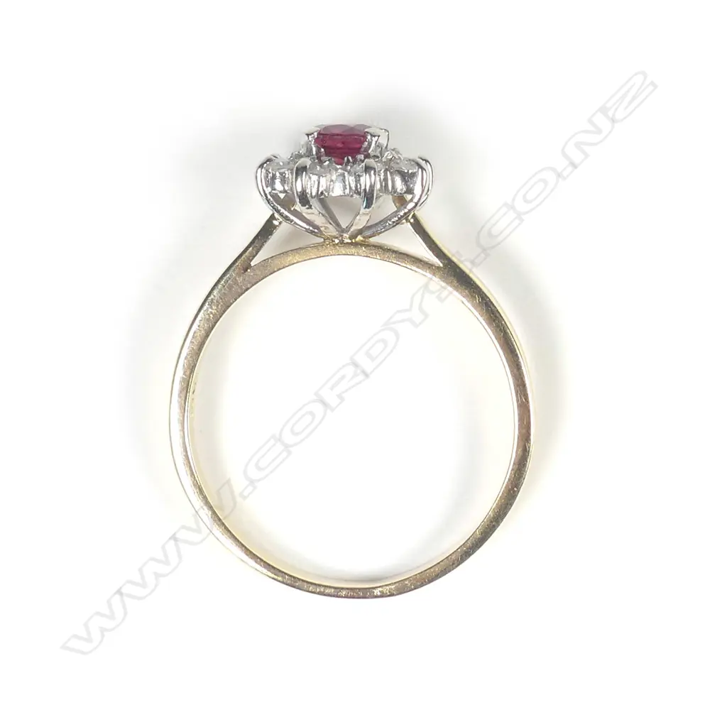An 18ct gold ruby and diamond ring Image 1++