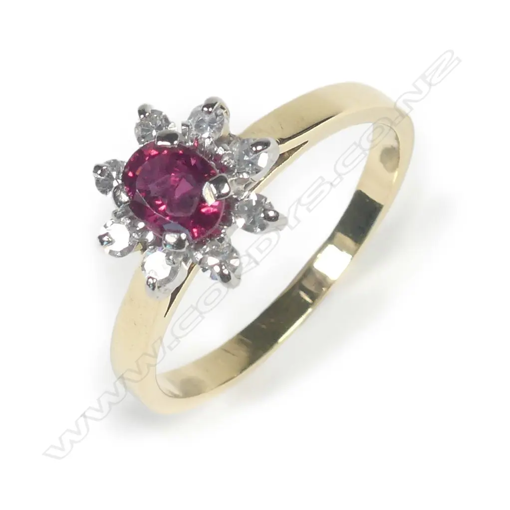 An 18ct gold ruby and diamond ring Image 1++