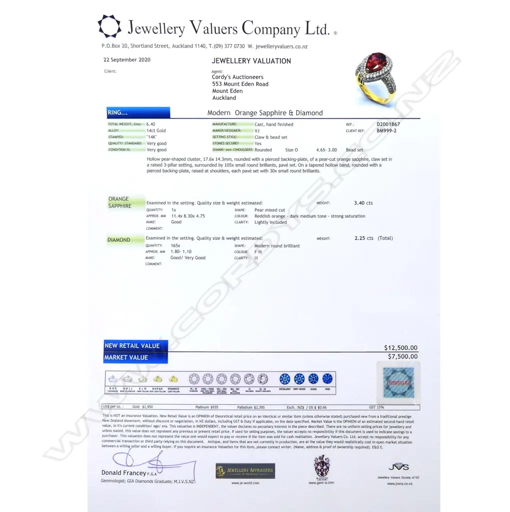 A 14ct gold orange sapphire and diamond ring Image 1++