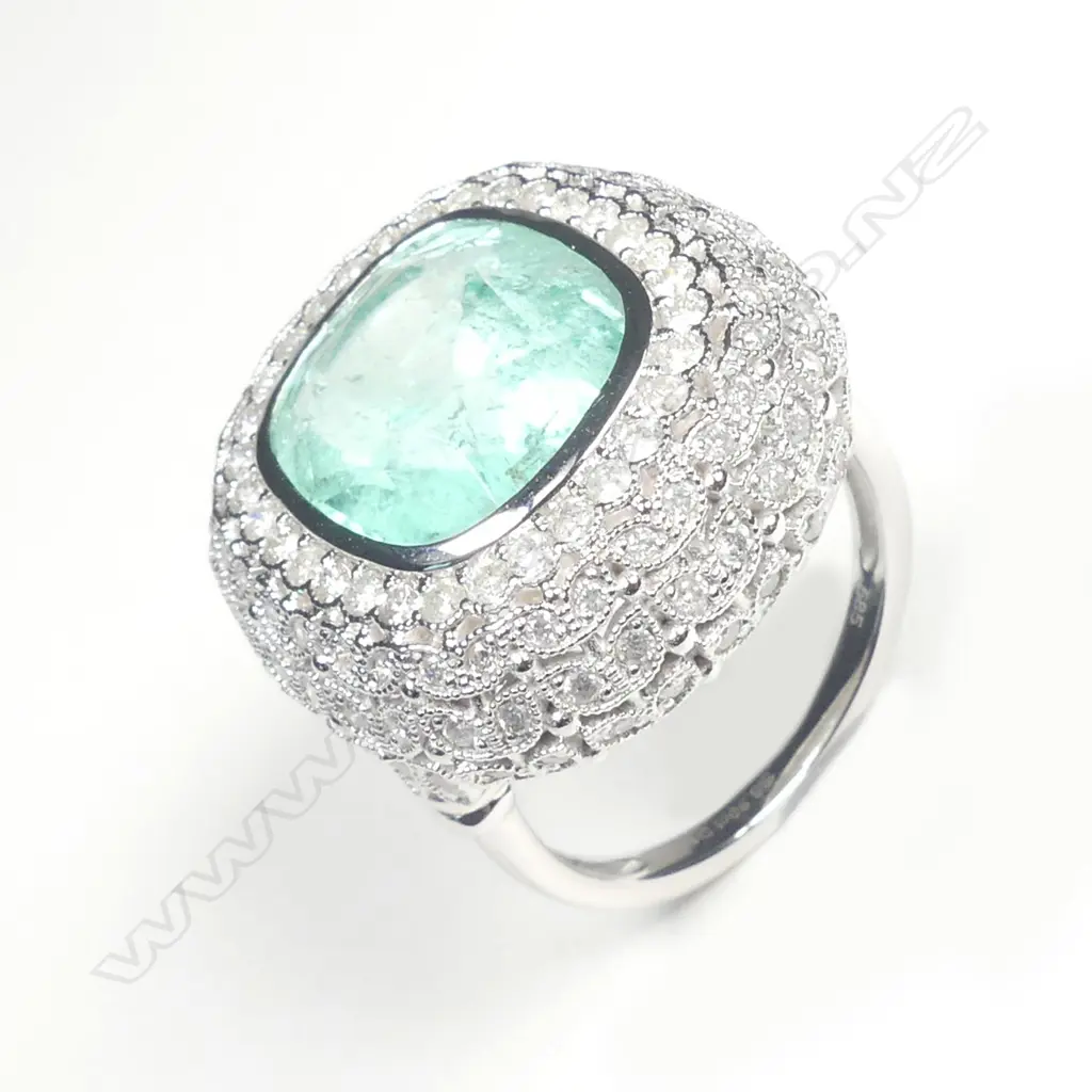 A 14ct white gold Zambian emerald and diamond ring Image 1++