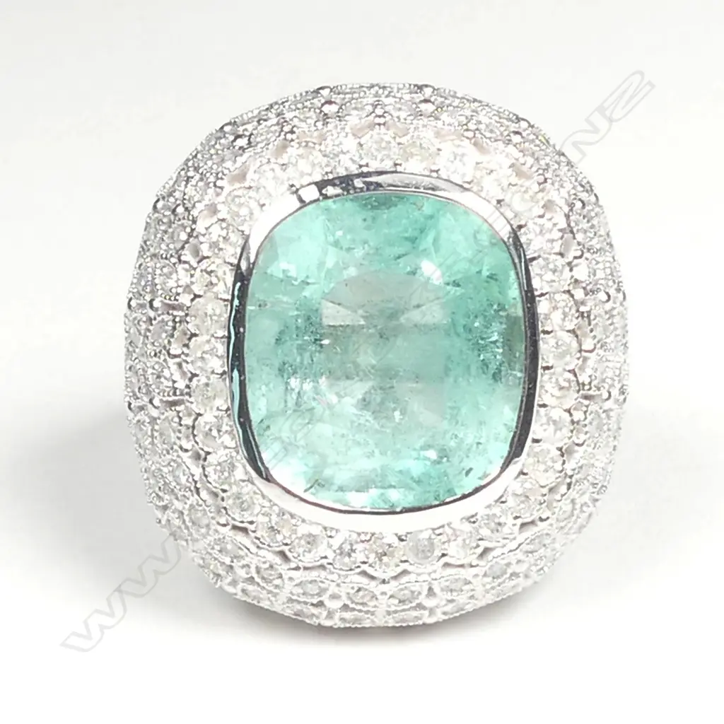 A 14ct white gold Zambian emerald and diamond ring Image 1++