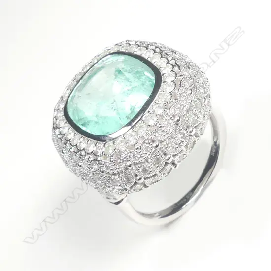 A 14ct white gold Zambian emerald and diamond ring