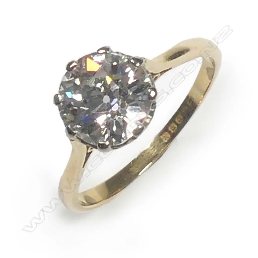 An estate 18ct gold and diamond solitaire ring Image 1++