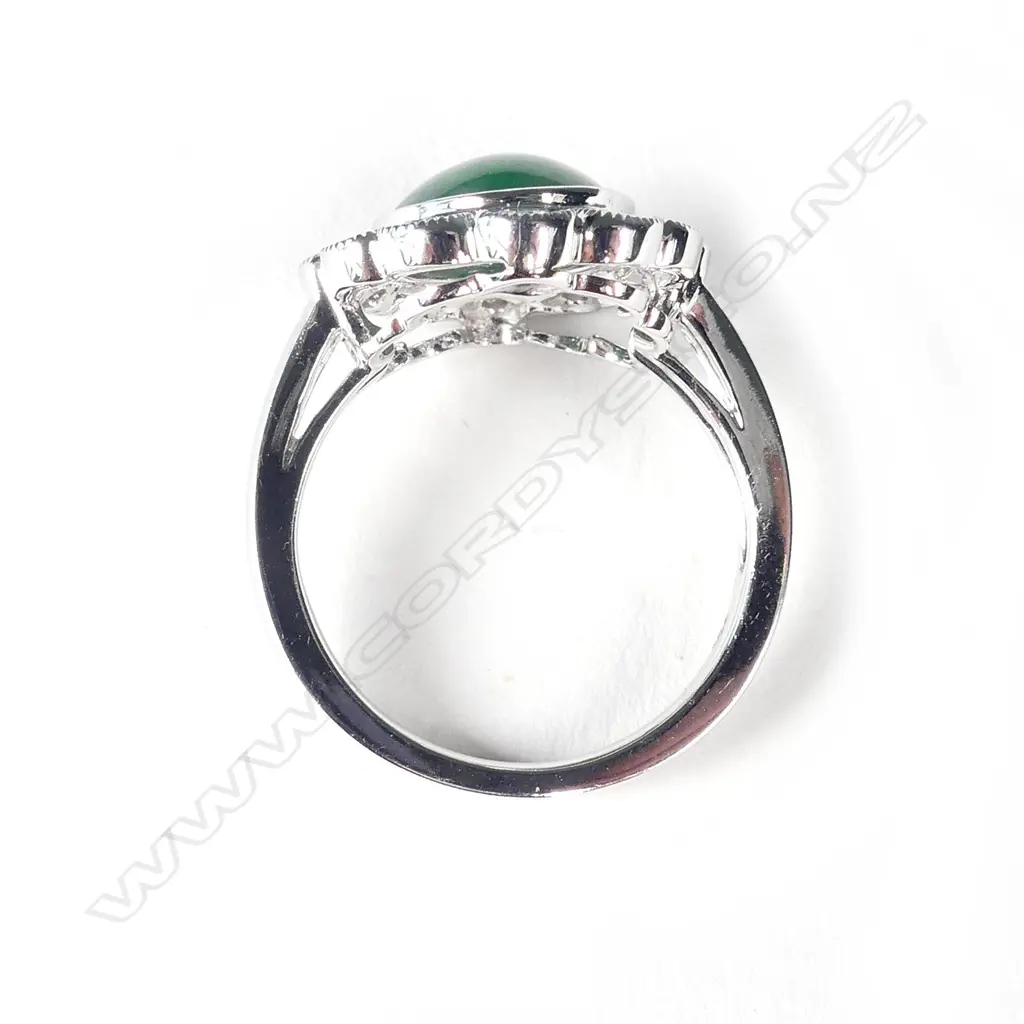 An 18ct white gold jade and diamond ring and earring set Image 1++