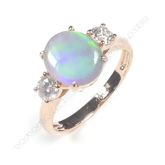 A 14ct rose gold opal and diamond ring