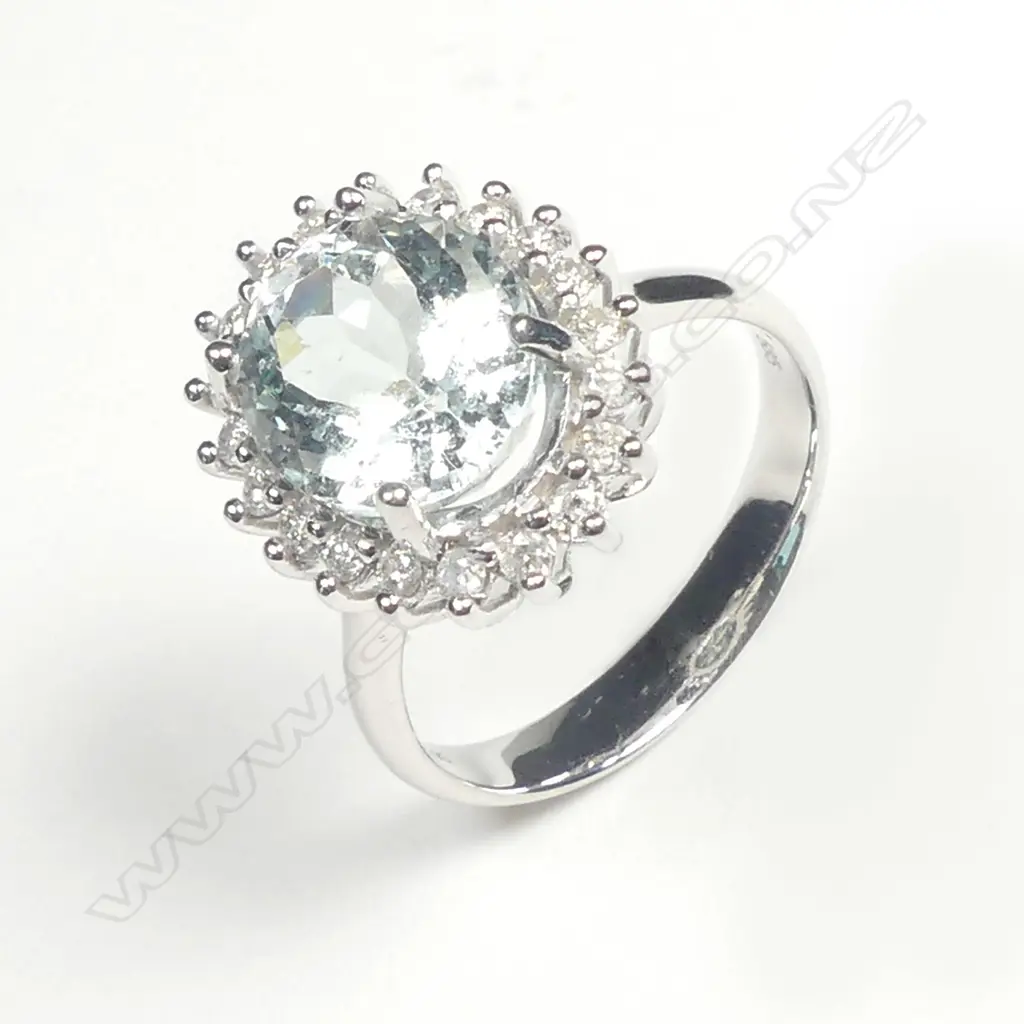 A 14ct white gold aquamarine and diamond ring Image 1++