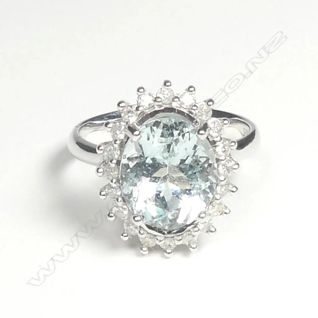 A 14ct white gold aquamarine and diamond ring Image 1++