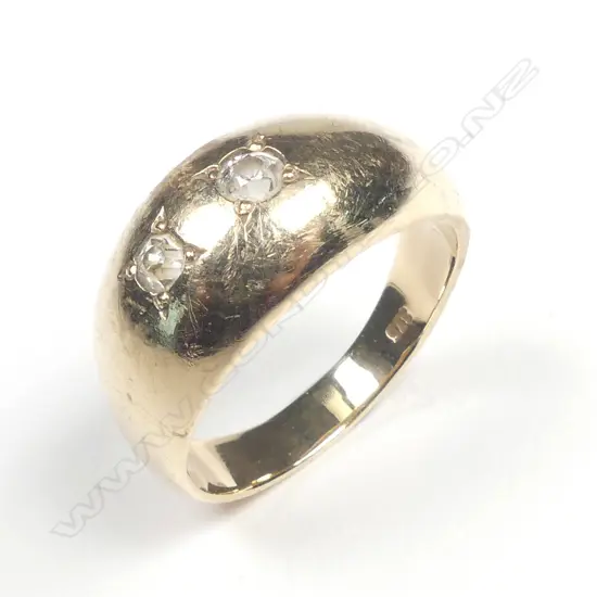 An estate 9ct gold and diamond ring