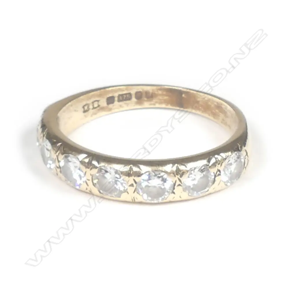 An estate 9ct gold and seven stone diamond ring Image 1++
