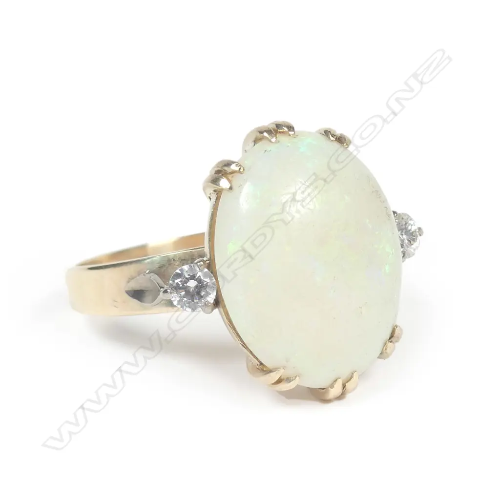 A vintage large opal and diamond dress ring Image 1++
