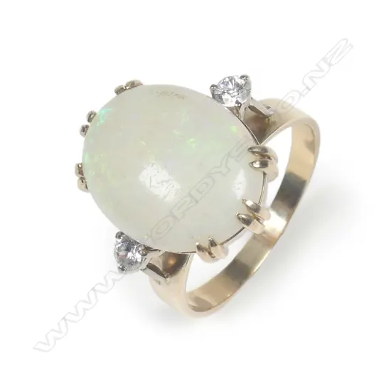 A vintage large opal and diamond dress ring