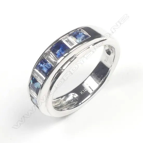 An18ct. white gold sapphire and diamond band ring