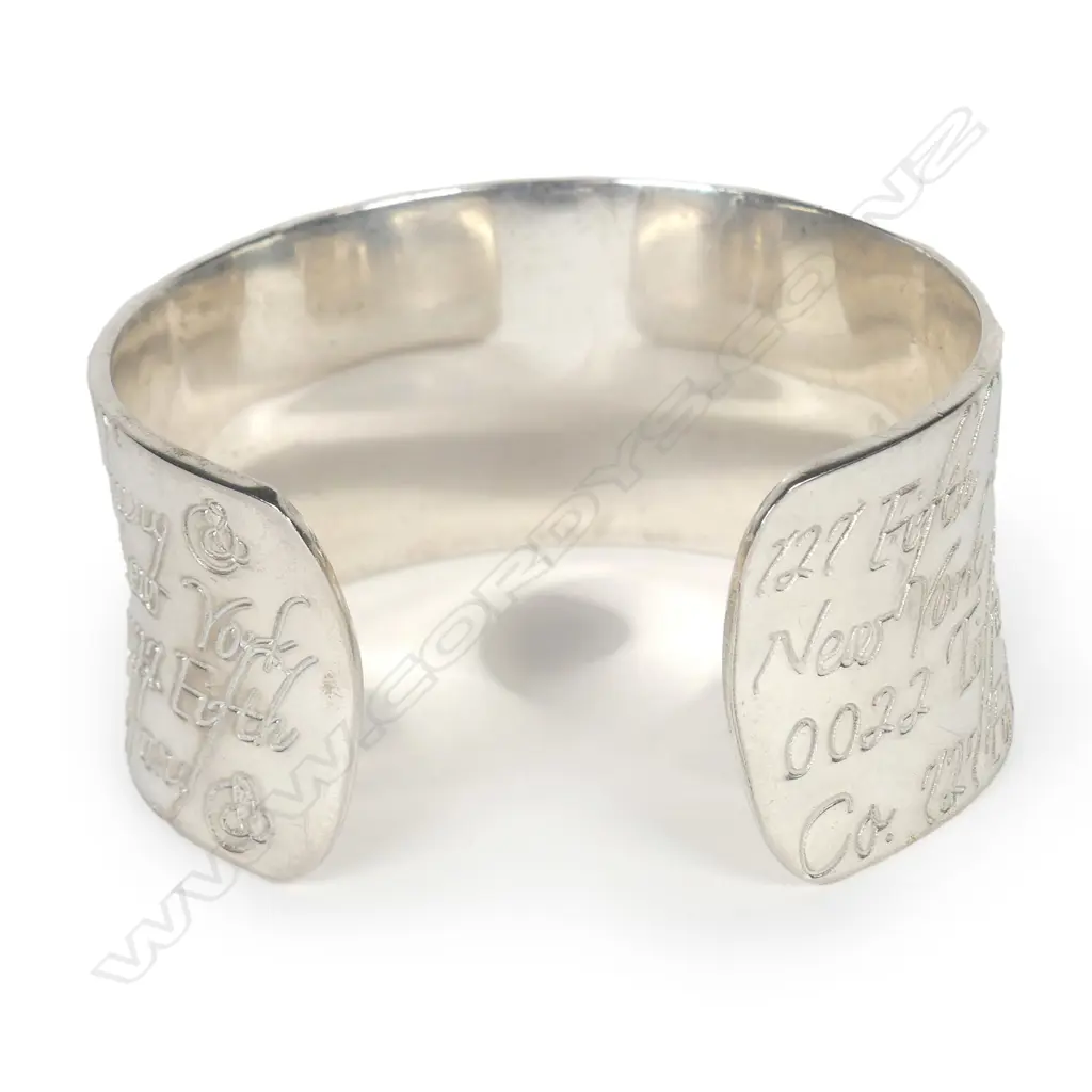 A modern Tiffany & Co. silver 'Notes' wide cuff bangle Image 1++