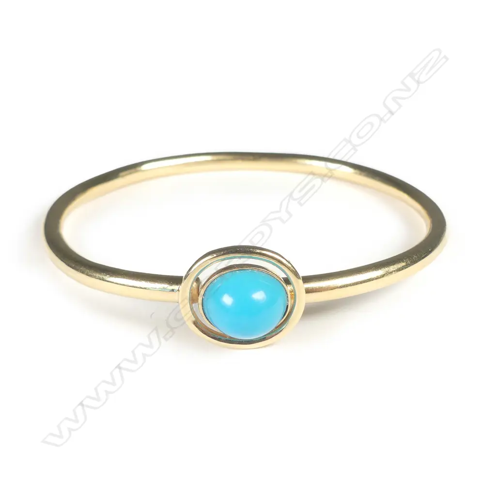 An 18ct gold and turquoise bangle Image 1++