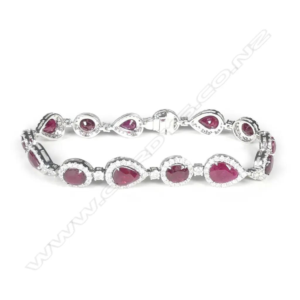 A platinum ruby and diamond halo bracelet Image 1++