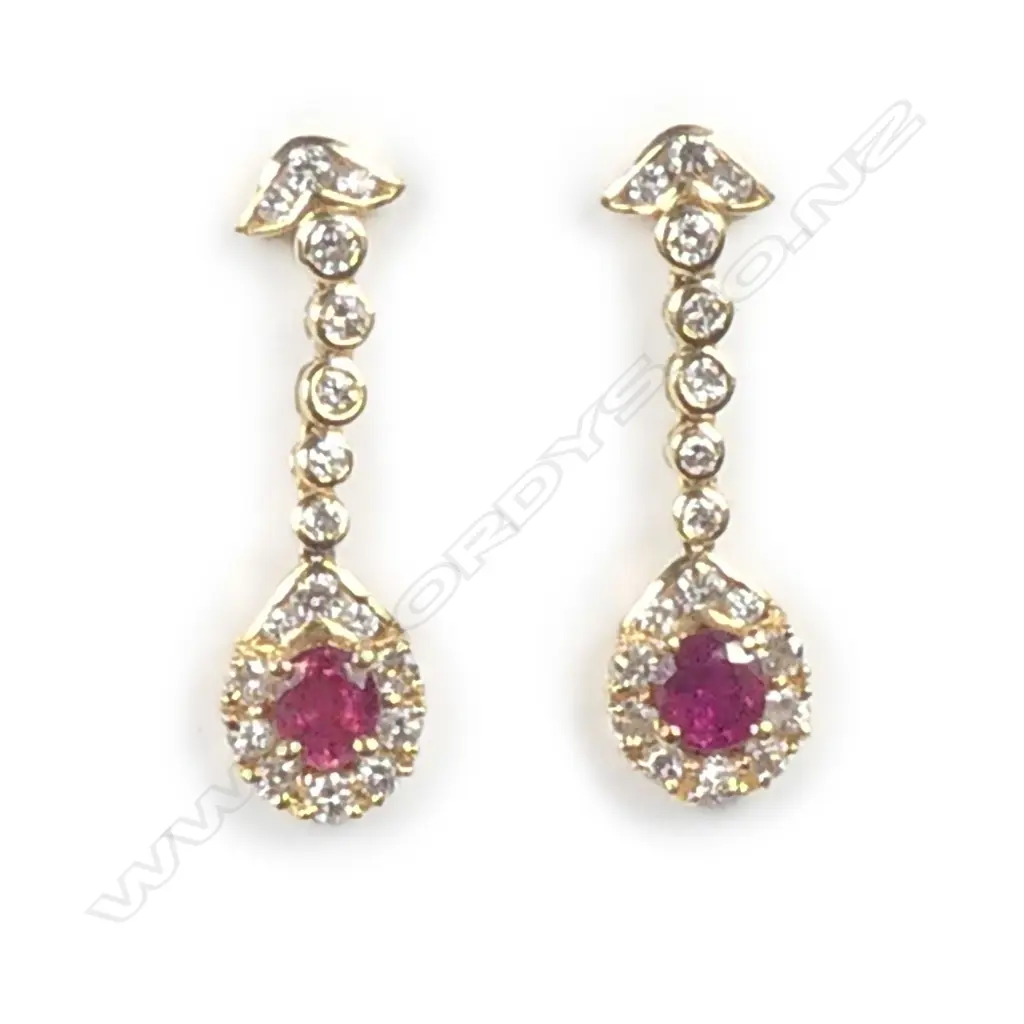 An 18ct. yellow gold ruby and diamond pair of drop earrings Image 1++